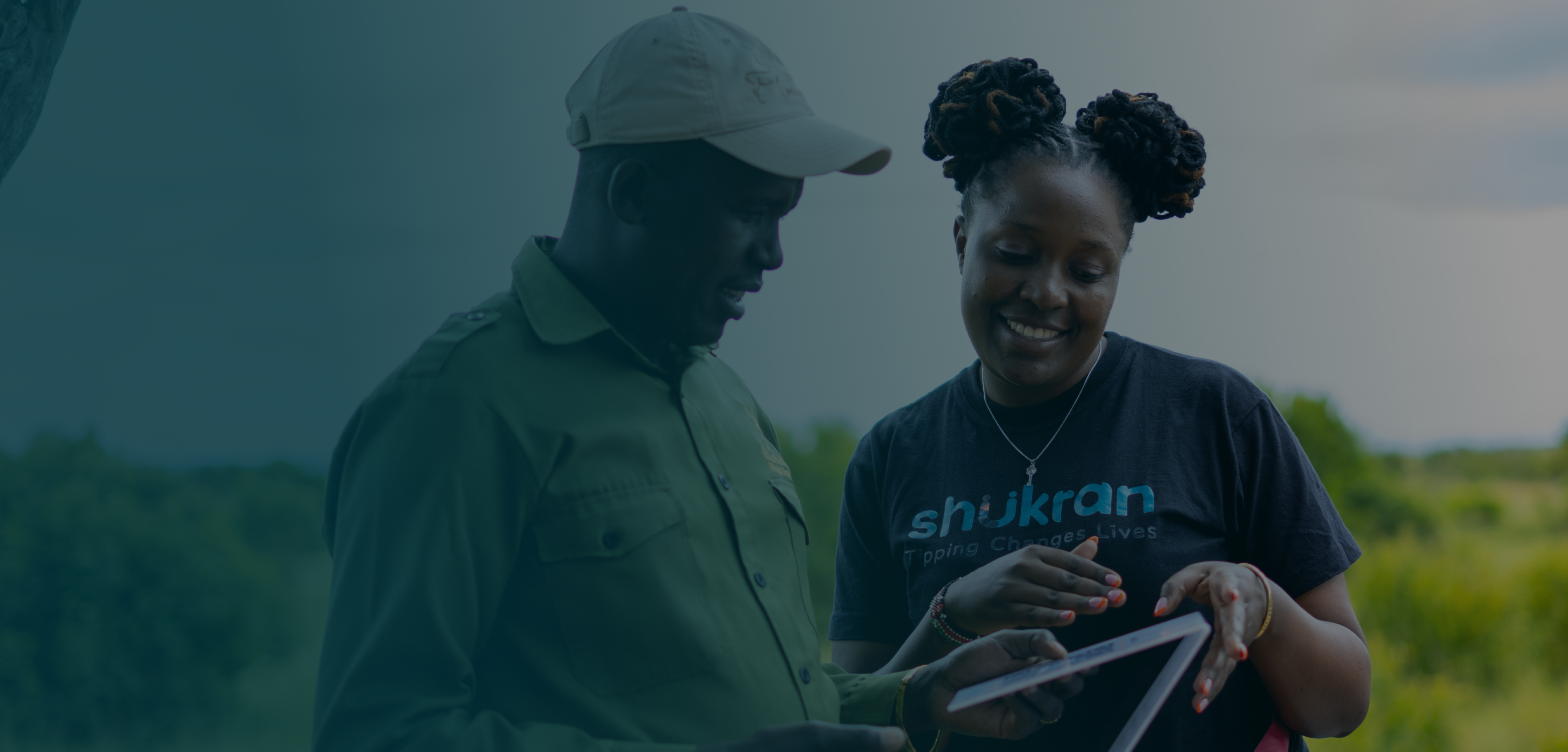 Restaurant staff looking at mobile device